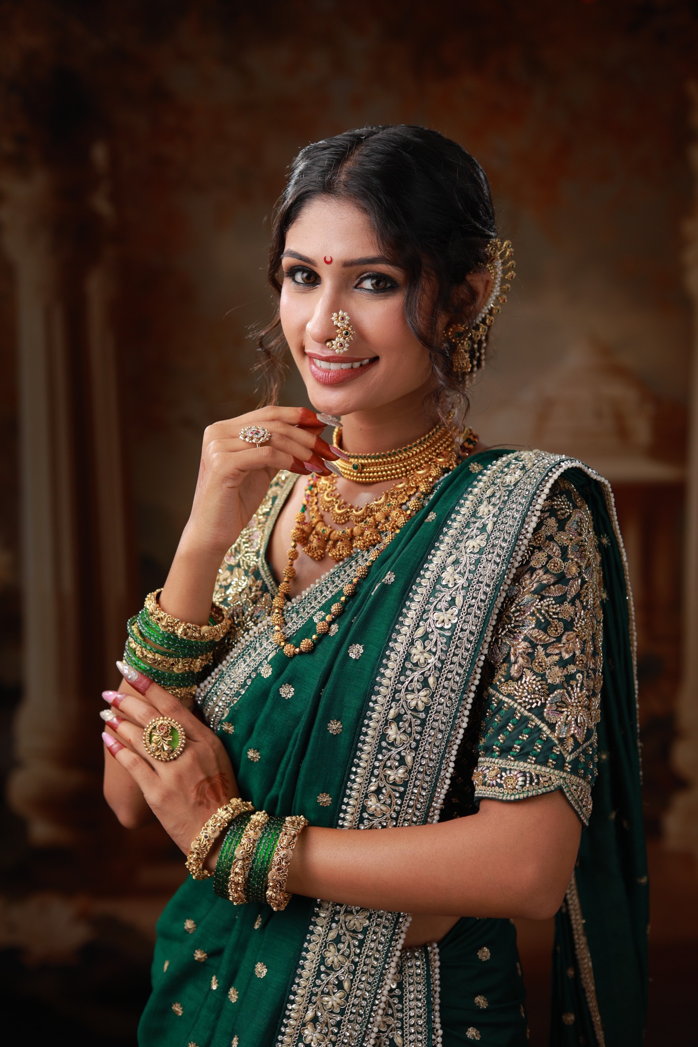 Reception makeup look in a red sari